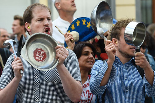 Activists protest against the Transatlantic Trade and Investment Partnership in Brussels, on July 12 (AFP photo)